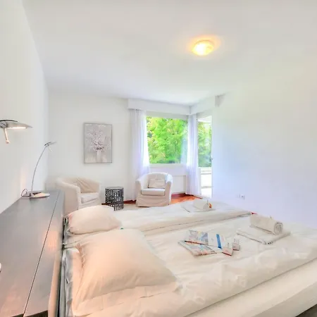 Residenza Parco Carona - Happy Apartment Lugano